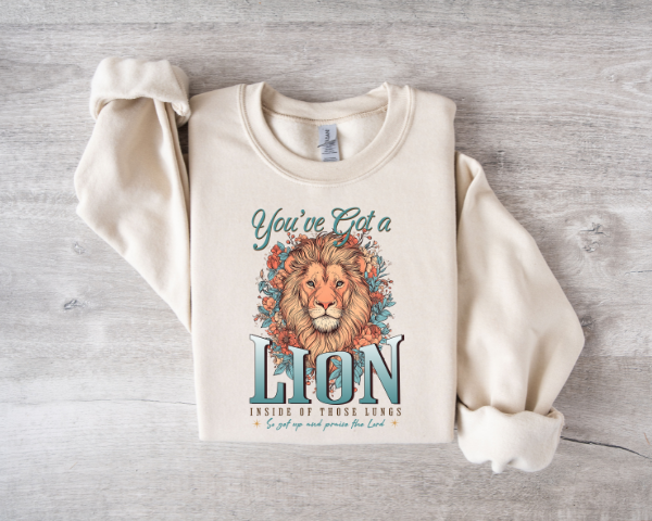 YOU'VE GOT A LION INSIDE OF YOUR LUNGS CREW NECK SWEATSHIRT