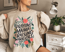 Load image into Gallery viewer, PRAYING MAMA RAISING WARRIORS CREWNECK SWEATSHIRT ADULT
